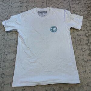 White Tee with Blue Logo by [Brand]
